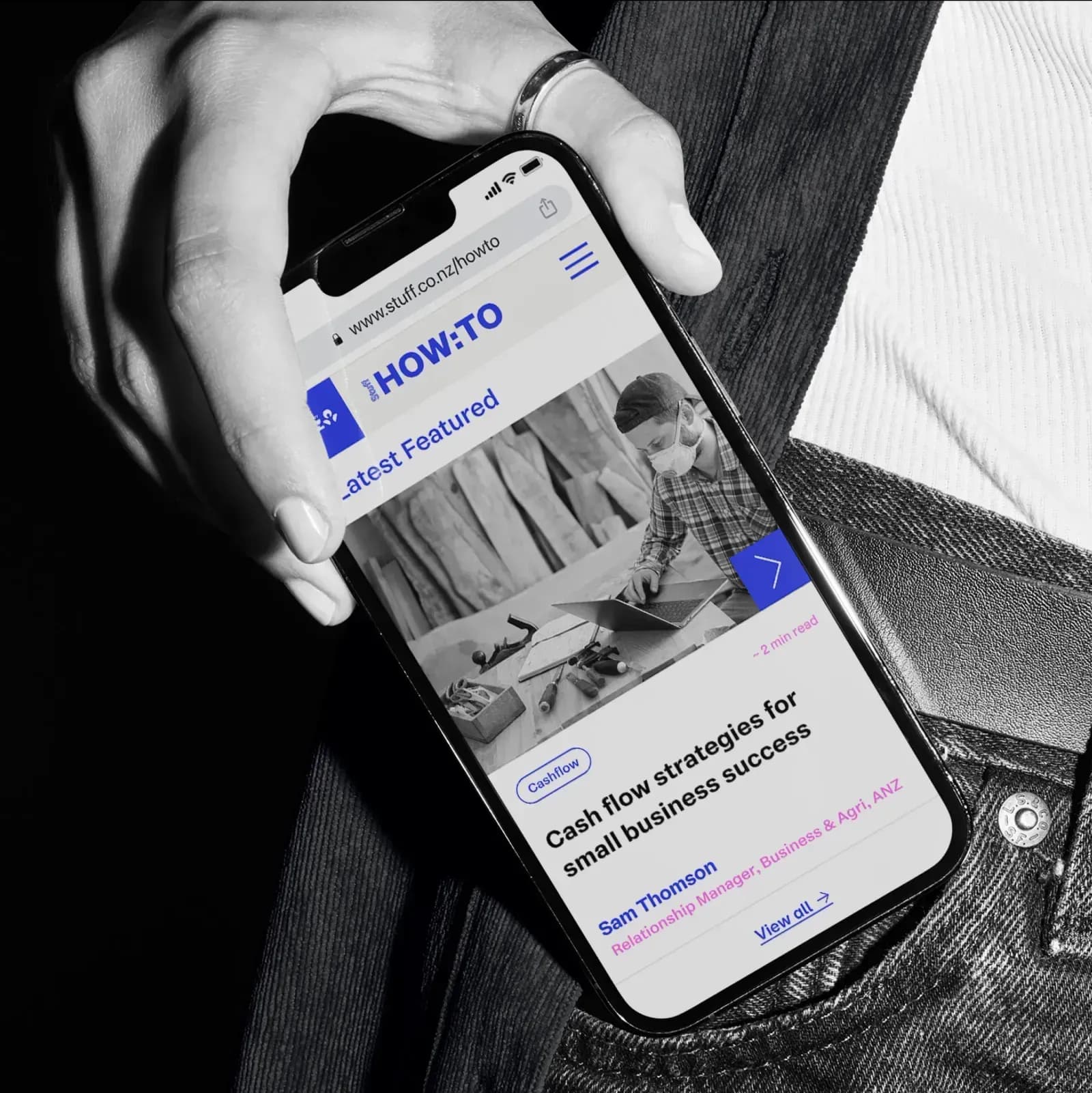 i phone being pulled out of a pocket with how to website on the screen 