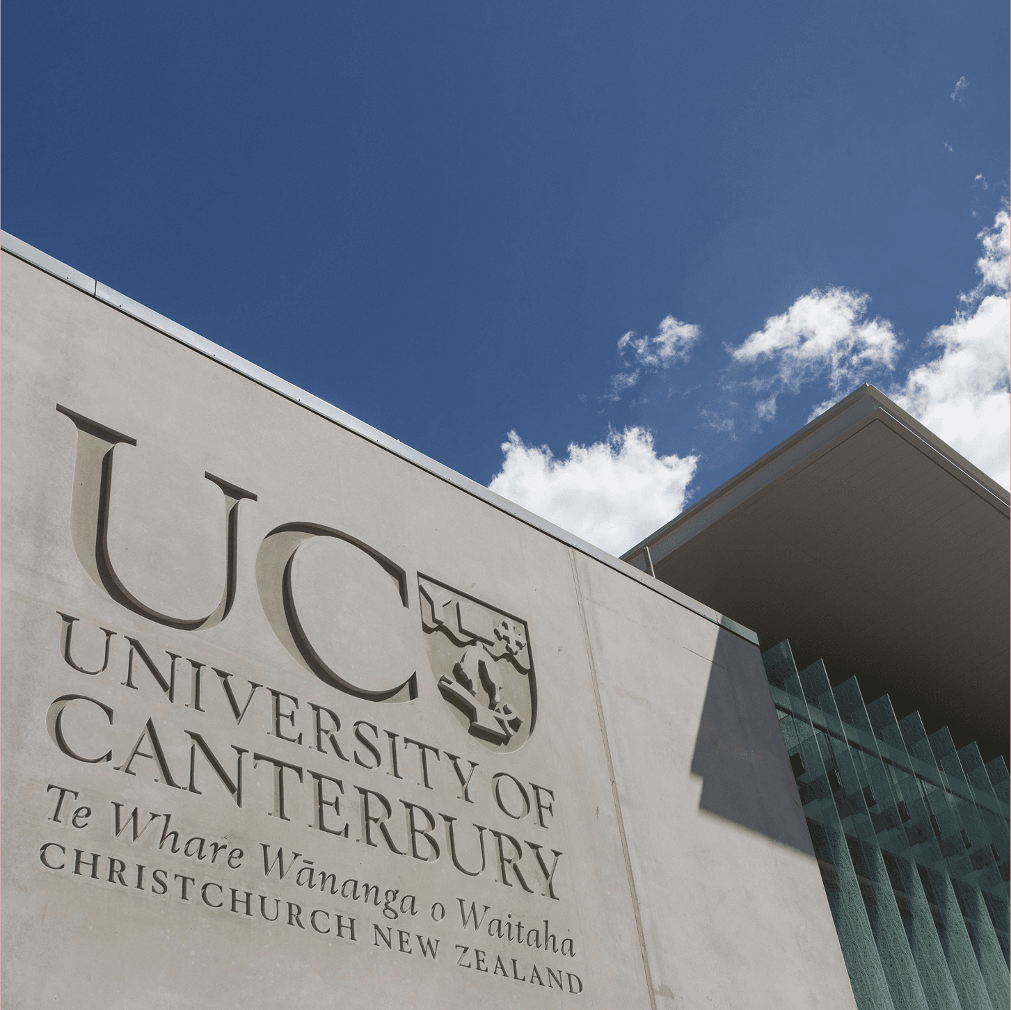 photo of a University of Canterbury building on campus against a blue sky 