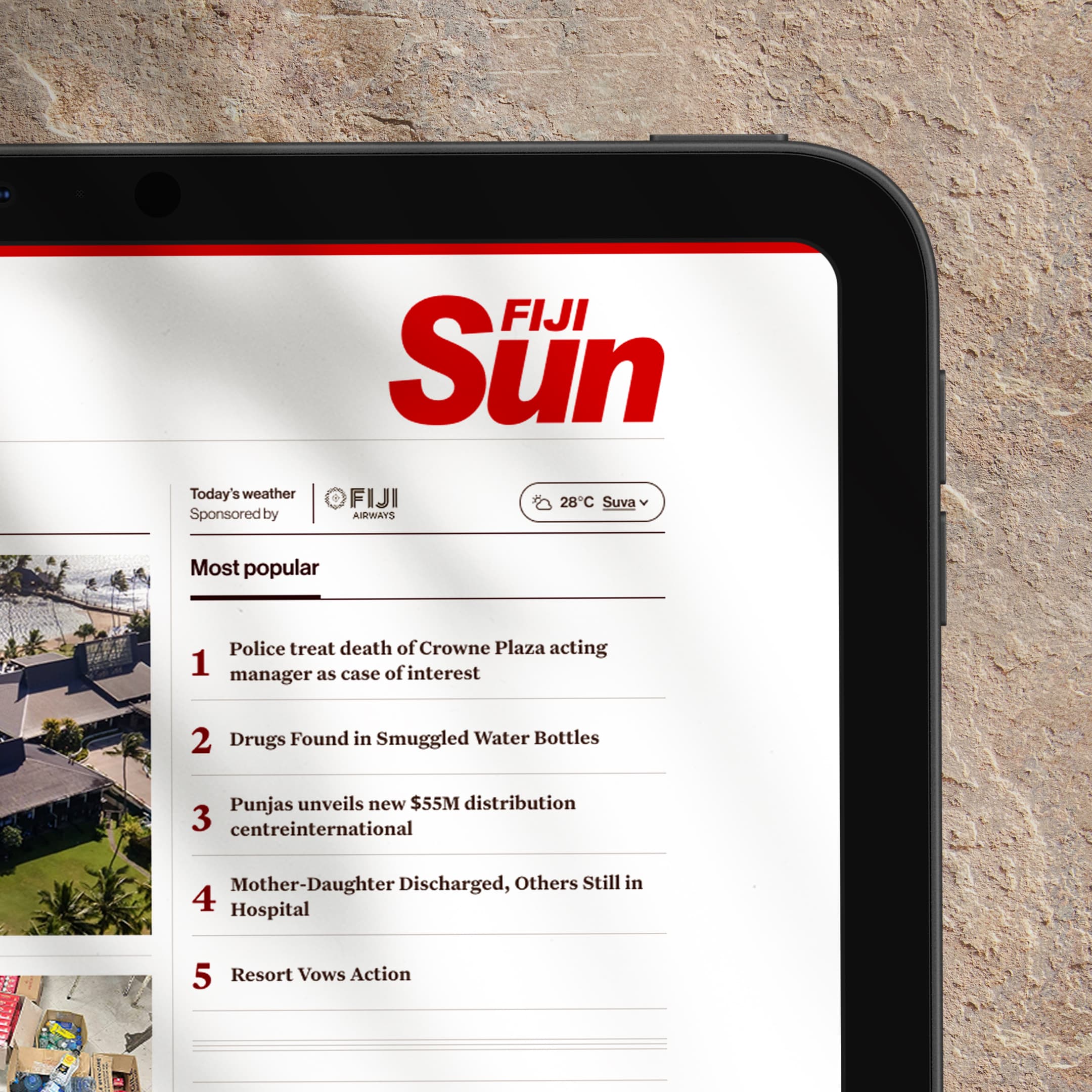 corner of an i pad showing the new Fiji Sun website
